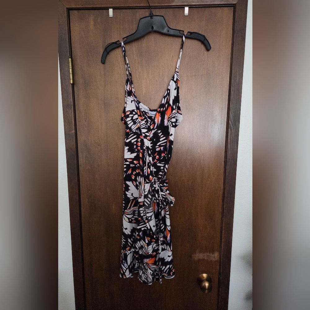 Veronica M Black and White Butterfly-Print Mini Dress with Orange Accents.